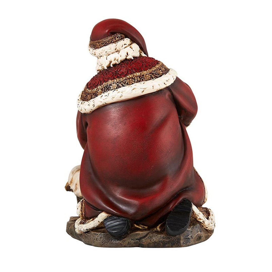 Adoring Santa Figurine